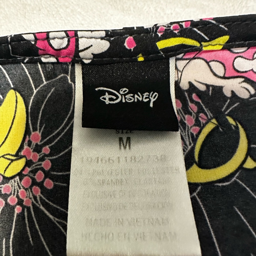 Disney Black Scrub Top with Pink & Yellow Floral Accents